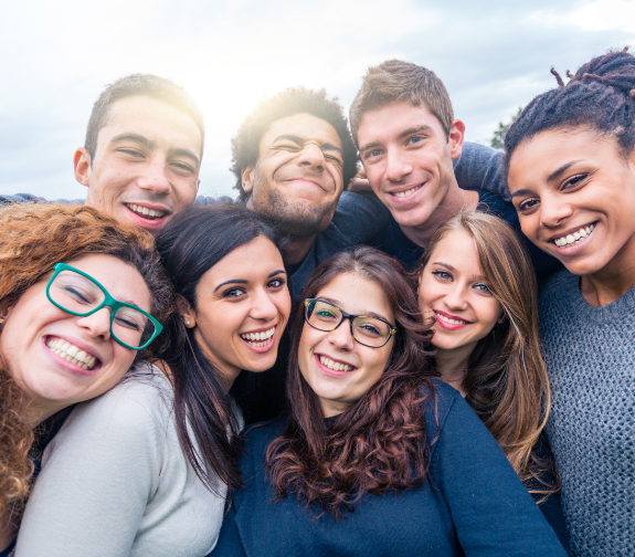 group of people smiling for a picture