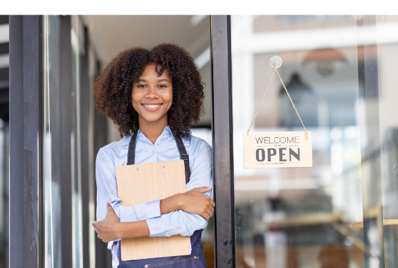 woman standing in front of store front